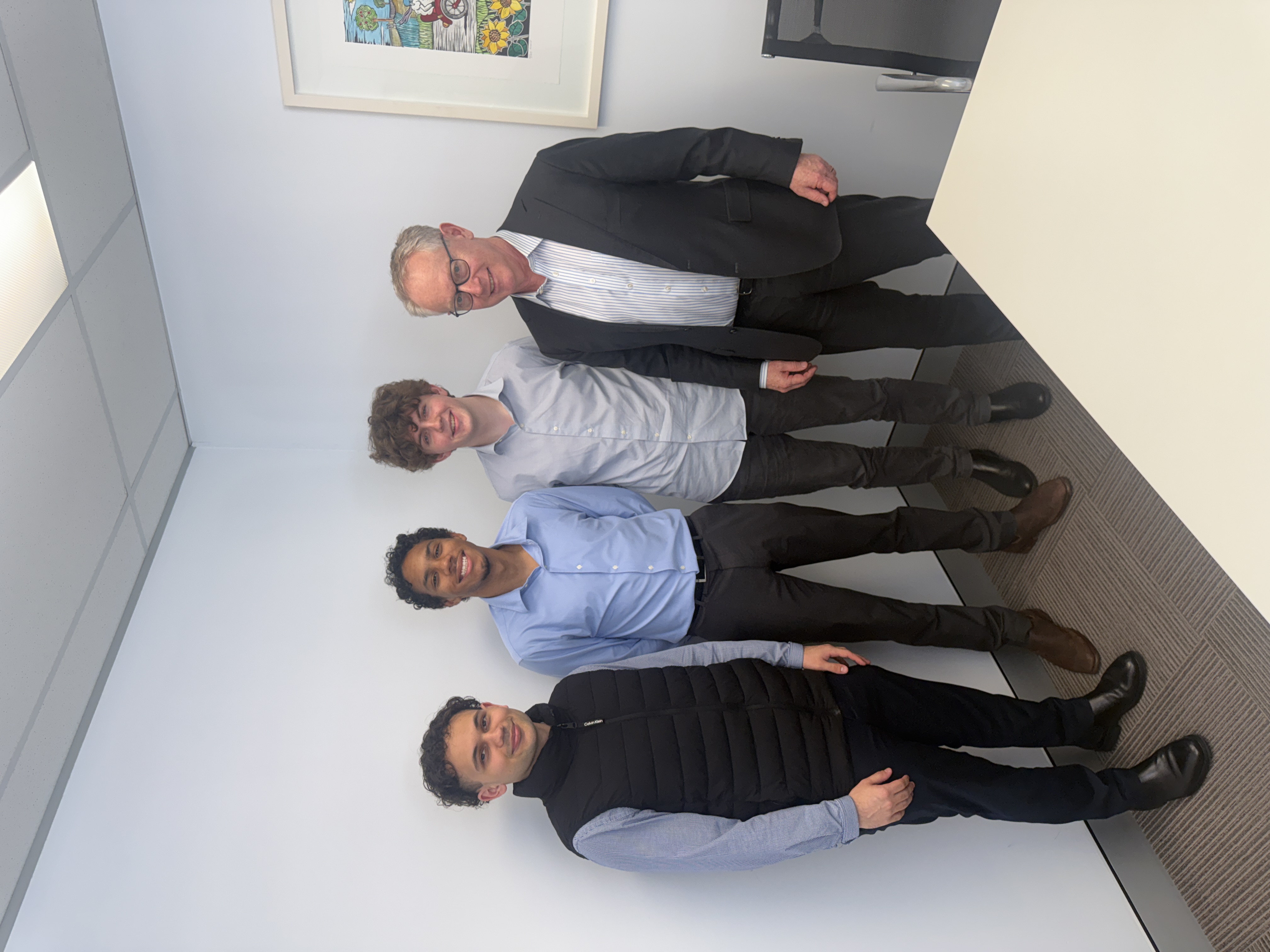 The Tony.Online team standing together at the office