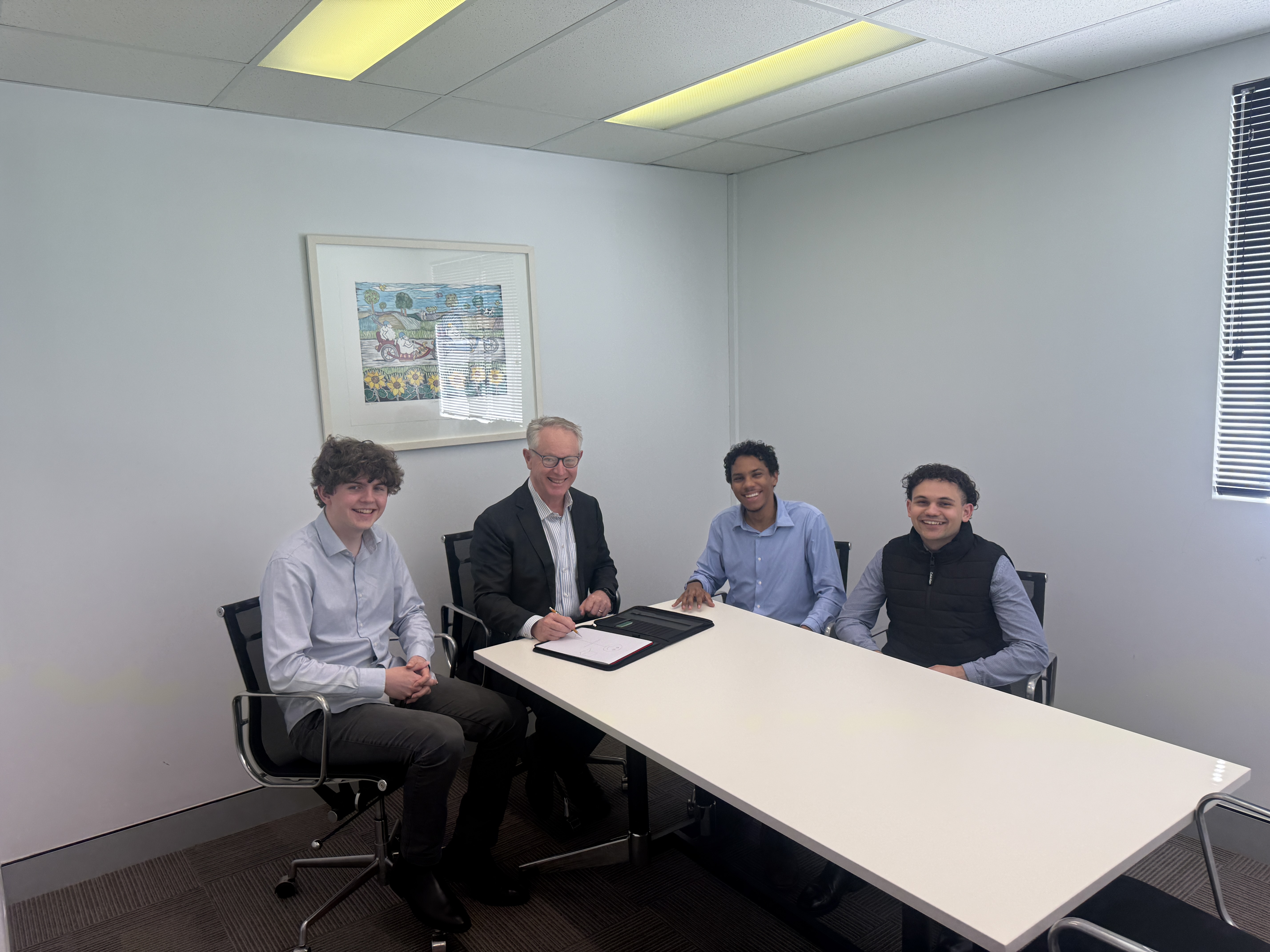 Evyn, Andrew, Gus and Marcus together at the Tony.Online office